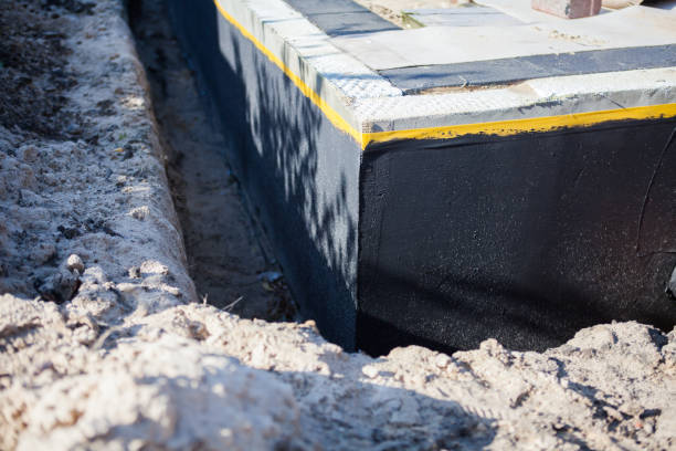 Professional Waterproofing technician working in Lyons, OH
